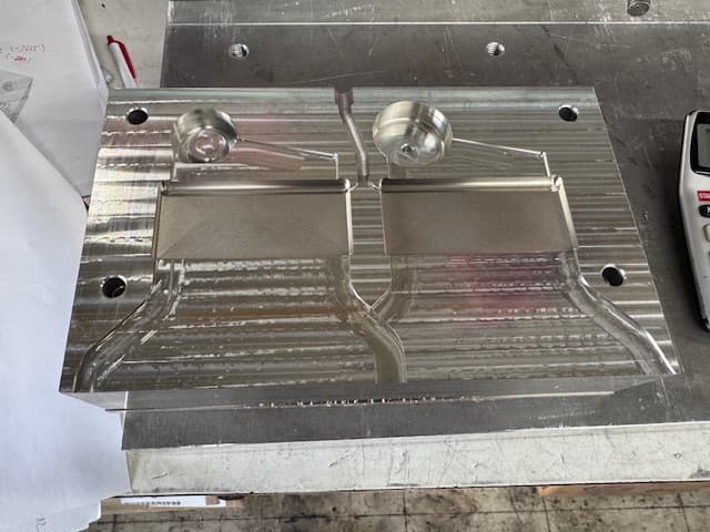 Completed bottom injection mold plate after manufacturing
