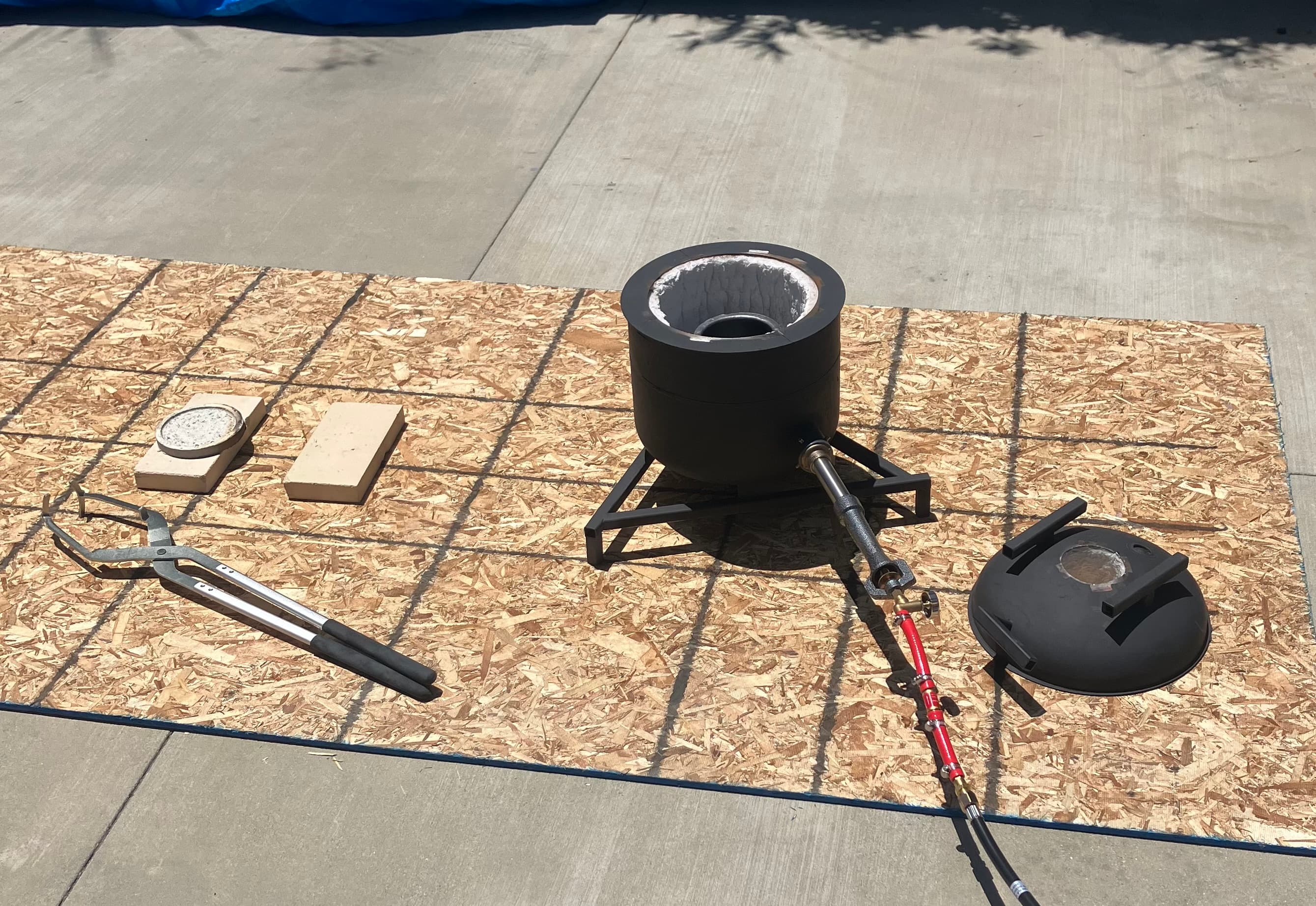 Completed propane-fired casting furnace during operation